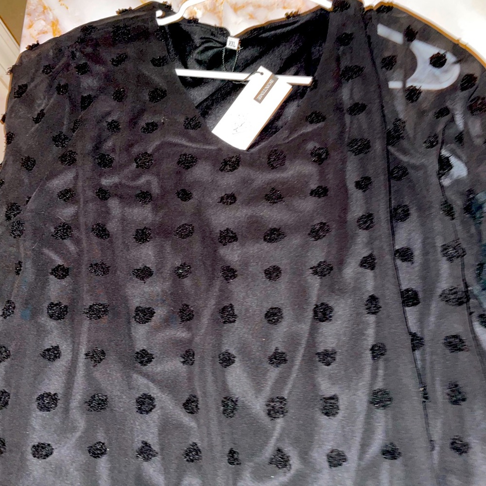 Black polka dot blouse